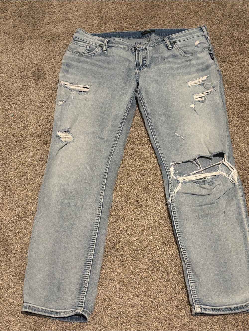 Silver Co Woman’s 3/4 length, light blue, Distressed jeans.